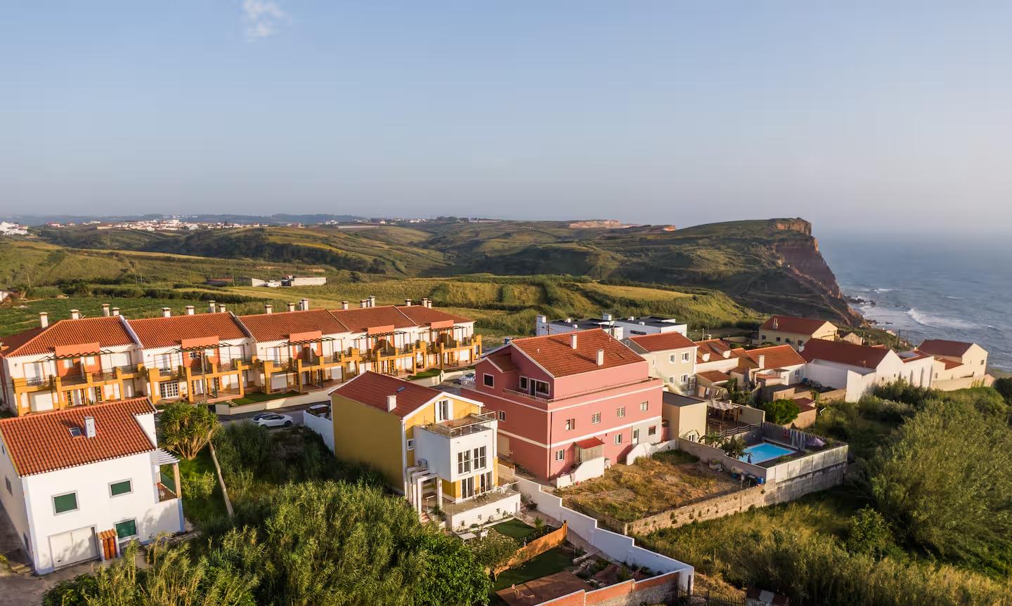 The house, the village and the cliff seen from above